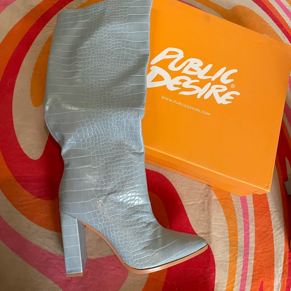 Knee high snakeskin boots